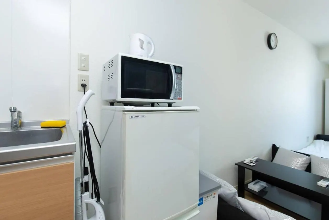 ゲストハウス大国町駅前 Osaca Apartamento