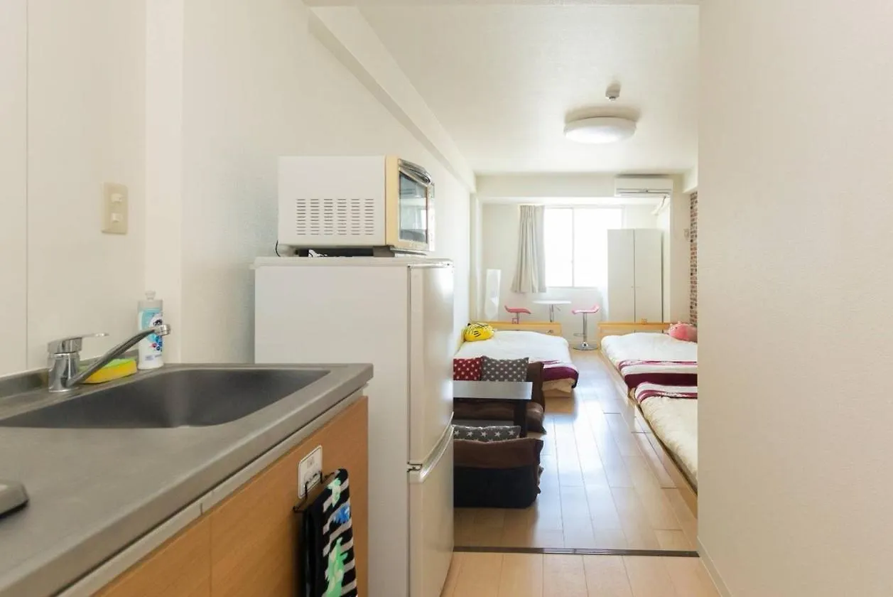 ゲストハウス大国町駅前 Osaka Apartment